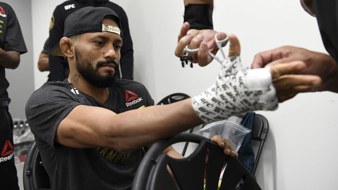 LAS VEGAS, NEVADA - NOVEMBER 21: Deiveson Figueiredo of Brazil has his hands wrapped backstage during the UFC 255 event at UFC APEX on November 21, 2020 in Las Vegas, Nevada.