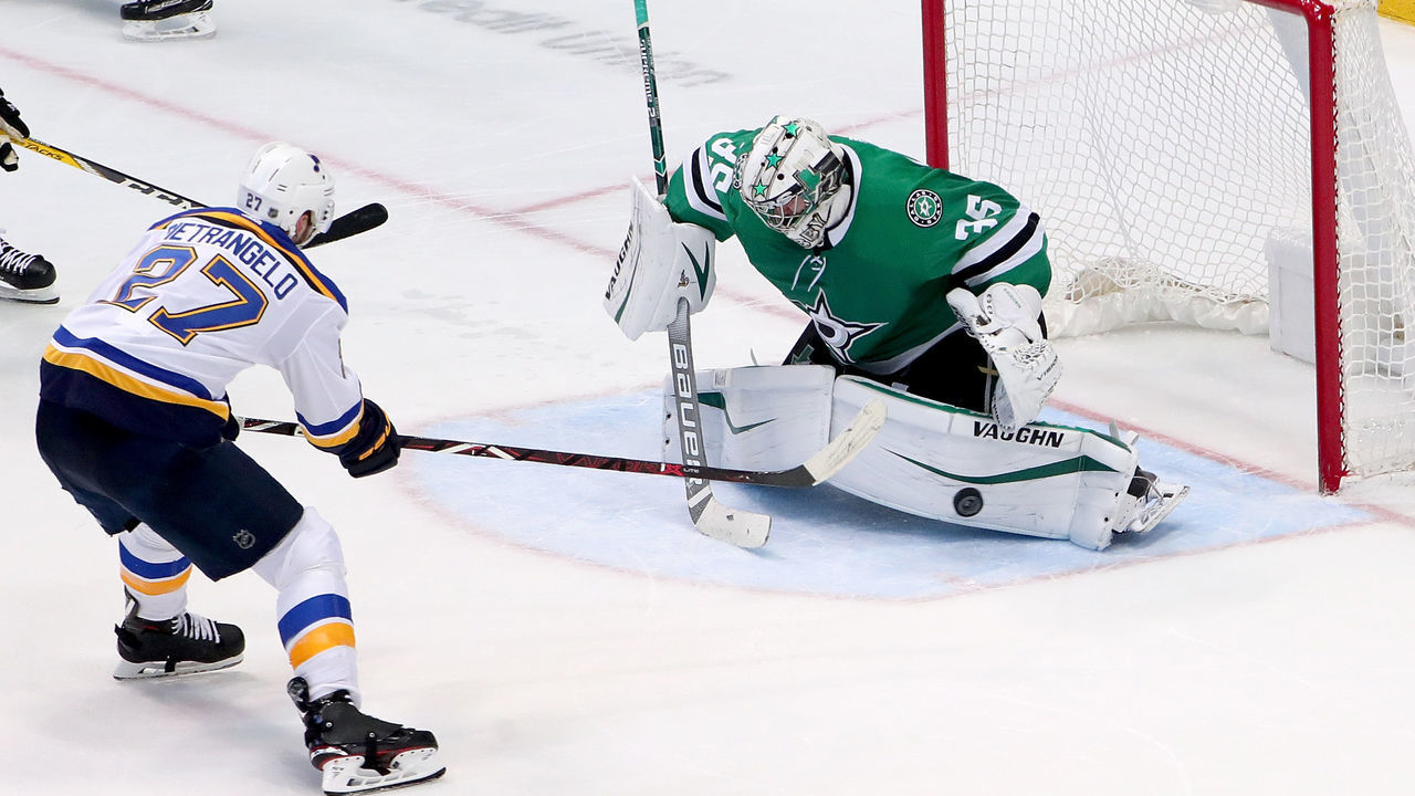 DALLAS, TX - FEBRUARY 21: Anton Khudobin #35 of the Dallas Stars blocks a shot on goal against Alex Pietrangelo #27 of the St. Louis Blues in the third period at American Airlines Center on February 21, 2019 in Dallas, Texas.