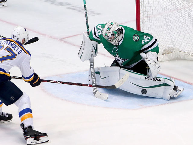DALLAS, TX - FEBRUARY 21: Anton Khudobin #35 of the Dallas Stars blocks a shot on goal against Alex Pietrangelo #27 of the St. Louis Blues in the third period at American Airlines Center on February 21, 2019 in Dallas, Texas.