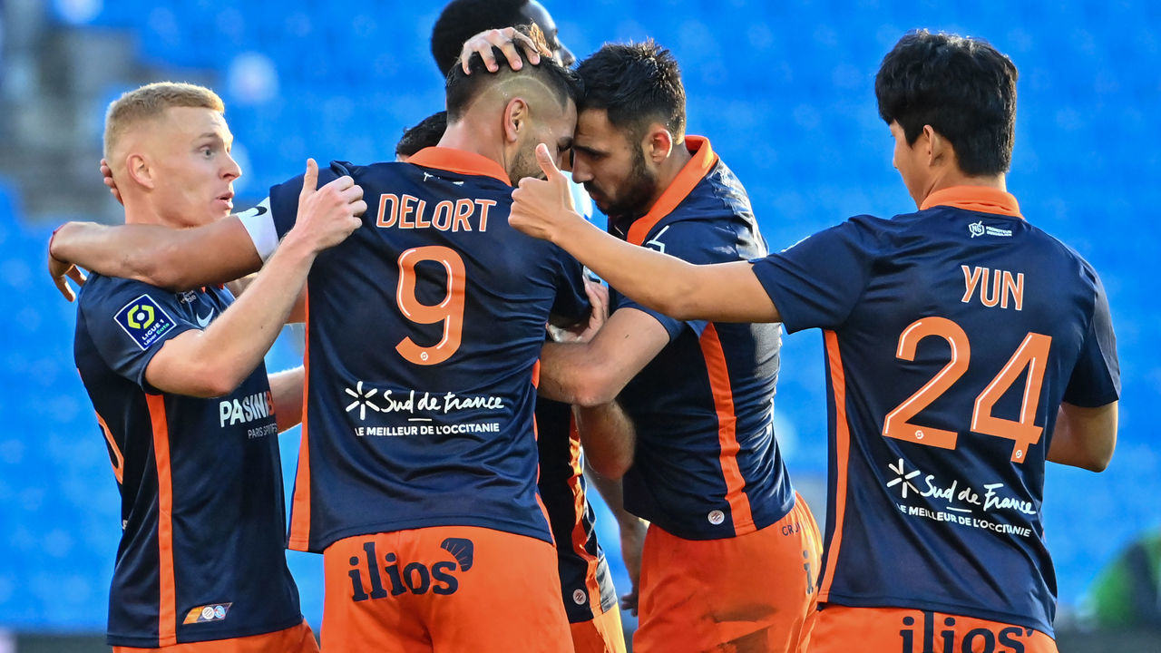 Montpellier's players celebrate after scoring a goal during the French L1 football match between Montpellier and Strasbourg at the Mosson stadium in Montpellier, southern France, on November 22, 2020.