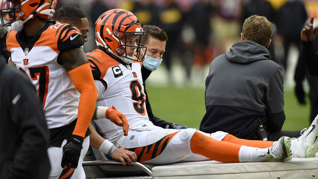 LANDOVER, MD - NOVEMBER 22: Joe Burrow (9) reacts as he is carted off the field after being injured during the Cincinnati Bengals vs. Washington Football Team NFL game at FedEx Field on November 22, 2020 in Landover, MD.