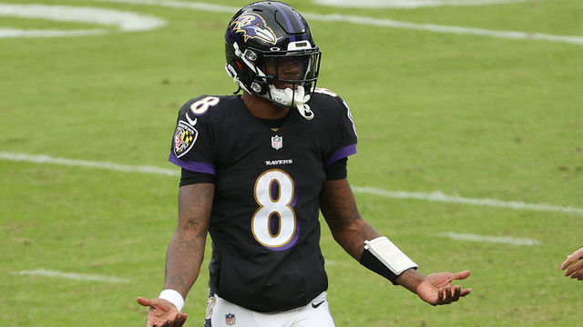 BALTIMORE, MARYLAND - NOVEMBER 22: Lamar Jackson #8 of the Baltimore Ravens reacts after throwing a third quarter interception to Amani Hooker #37 of the Tennessee Titans during the game at M&T Bank Stadium on November 22, 2020 in Baltimore, Maryland.