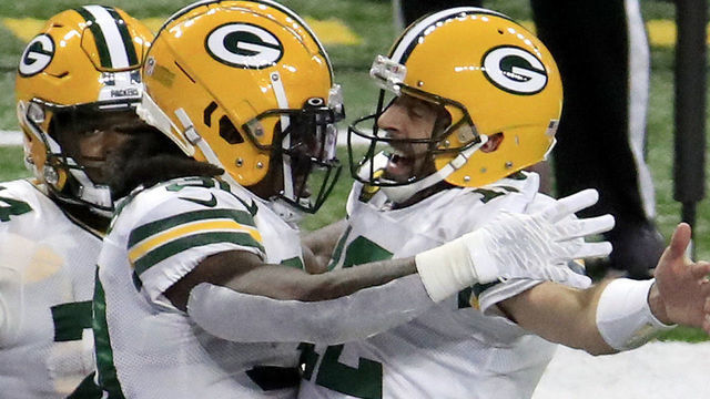 INDIANAPOLIS, INDIANA - NOVEMBER 22: Jamaal Williams #30 (C) of the Green Bay Packers celebrates a touchdown with Aaron Rodgers #12 during the second quarter against the Indianapolis Colts in the game at Lucas Oil Stadium on November 22, 2020 in Indianapolis, Indiana.
