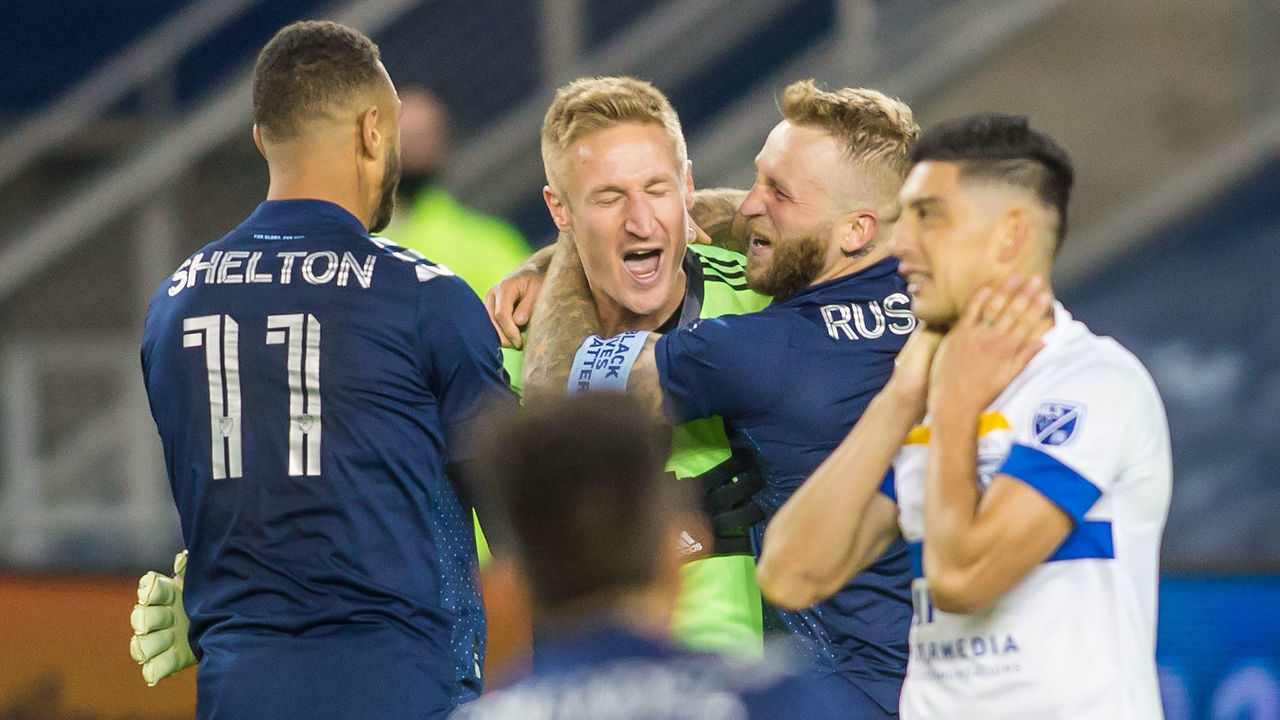 KANSAS CITY, KS - NOVEMBER 22: Sporting Kansas City goalkeeper Tim Melia (29) celebrates with teammates after his third pk save securing his teams victory during the MLS playoff match between Sporting Kansas City and the San Jose Earthquakes on Sunday November 22, 2020 at Childrens Mercy Park in Kansas City, KS.