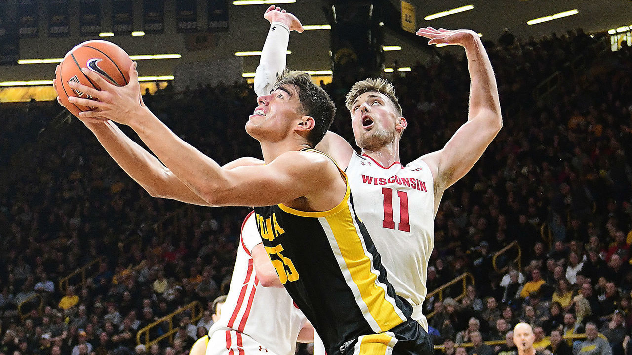 IOWA CITY. IA- JANUARY 27: Iowa forward Luka Garza (55) tries to put up a shot over Wisconsin forward Micah Potter (11) during a Big Ten Conference game between the Wisconsin Badgers and the Iowa Hawkeyes at Carver-Hawkeye Arena, Iowa City Ia, on January 27, 2020. Photo by Keith Gillett/Icon Sportswire via Getty Images)