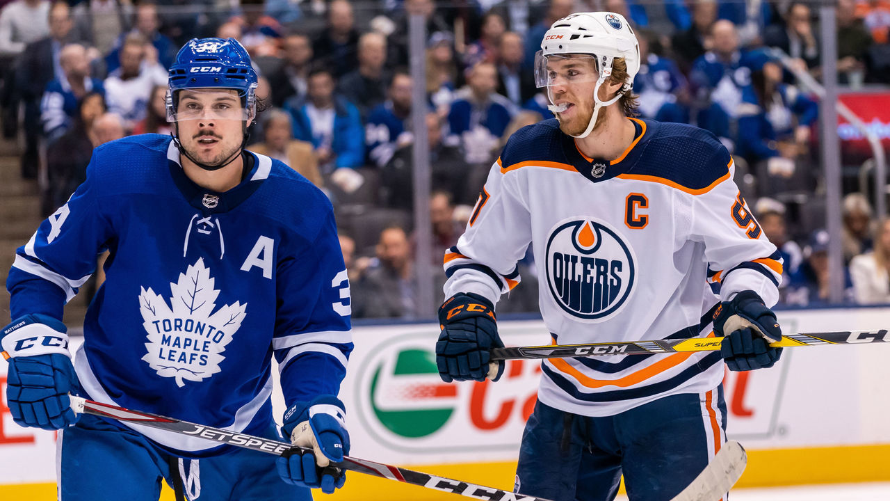 TORONTO, ON - JANUARY 6: Connor McDavid #97 of the Edmonton Oilers looks at Auston Matthews #34 of the Toronto Maple Leafs during the third period at the Scotiabank Arena on January 6, 2020 in Toronto, Ontario, Canada.