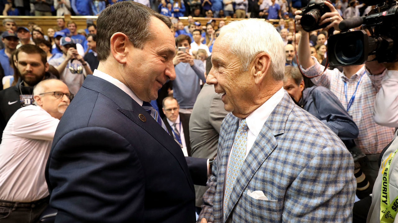 DURHAM, NC - MARCH 03: (L-R) Head coach Mike Krzyzewski of the Duke Blue Devils talks to head coach Roy Williams of the North Carolina Tar Heels before their game at Cameron Indoor Stadium on March 3, 2018 in Durham, North Carolina.