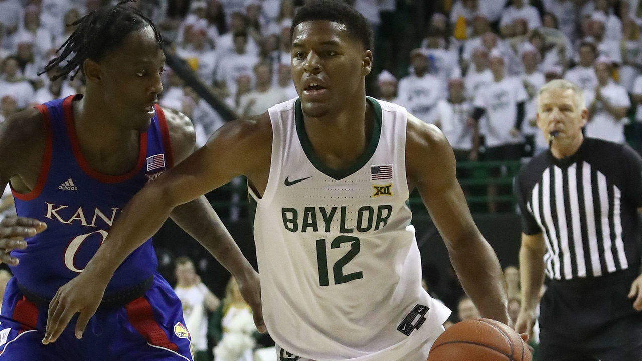 WACO, TEXAS - FEBRUARY 22: Jared Butler #12 of the Baylor Bears and Marcus Garrett #0 of the Kansas Jayhawks in the second half at Ferrell Center on February 22, 2020 in Waco, Texas.