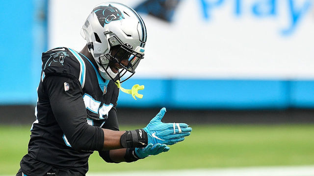 CHARLOTTE, NORTH CAROLINA - NOVEMBER 22: Brian Burns #53 of the Carolina Panthers reacts after a sack by Efe Obada #94 during the second half against the Detroit Lions at Bank of America Stadium on November 22, 2020 in Charlotte, North Carolina.