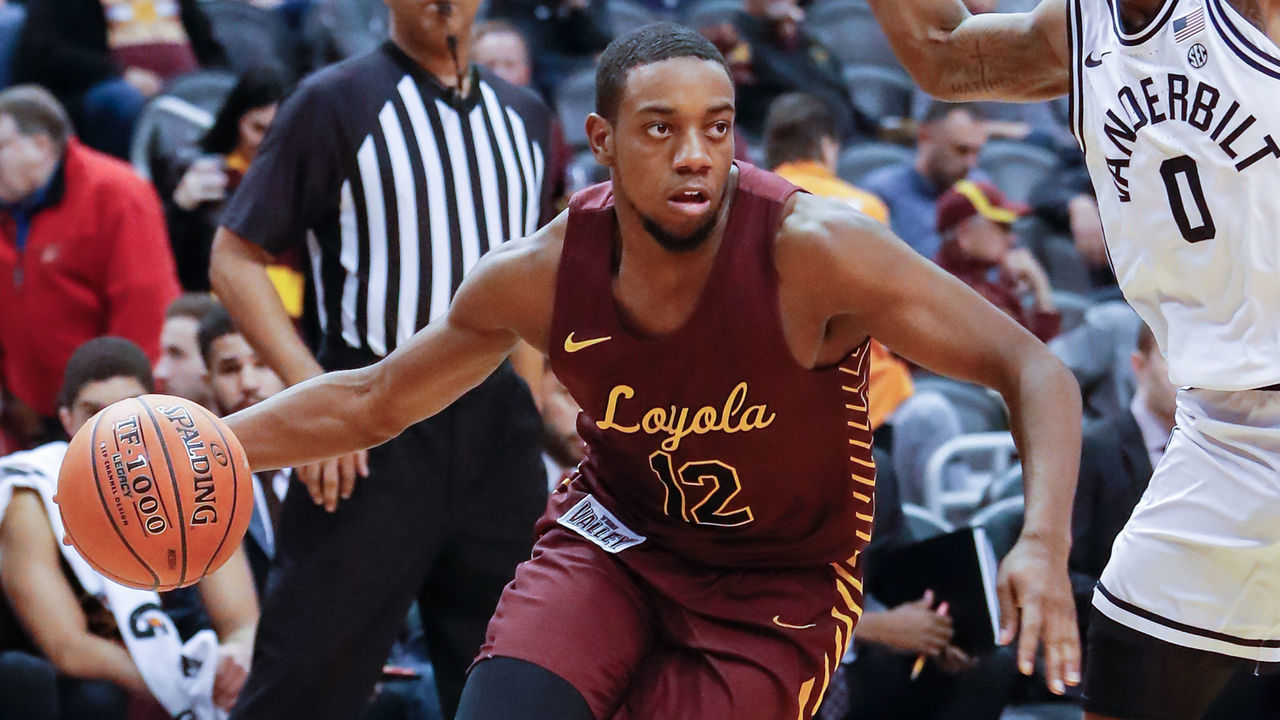 PHOENIX, AZ - DECEMBER 18: Loyola (Il) Ramblers guard Marquise Kennedy (12) drives to the basket during the college basketball game between the Vanderbilt Commodores and the Loyola Chicago Ramblers on December 18, 2019 at Talking Stick Resort Arena in Phoenix, Arizona.