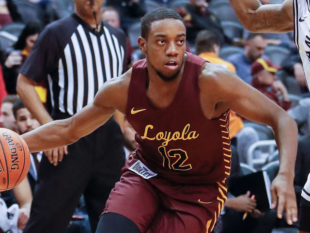 PHOENIX, AZ - DECEMBER 18: Loyola (Il) Ramblers guard Marquise Kennedy (12) drives to the basket during the college basketball game between the Vanderbilt Commodores and the Loyola Chicago Ramblers on December 18, 2019 at Talking Stick Resort Arena in Phoenix, Arizona.