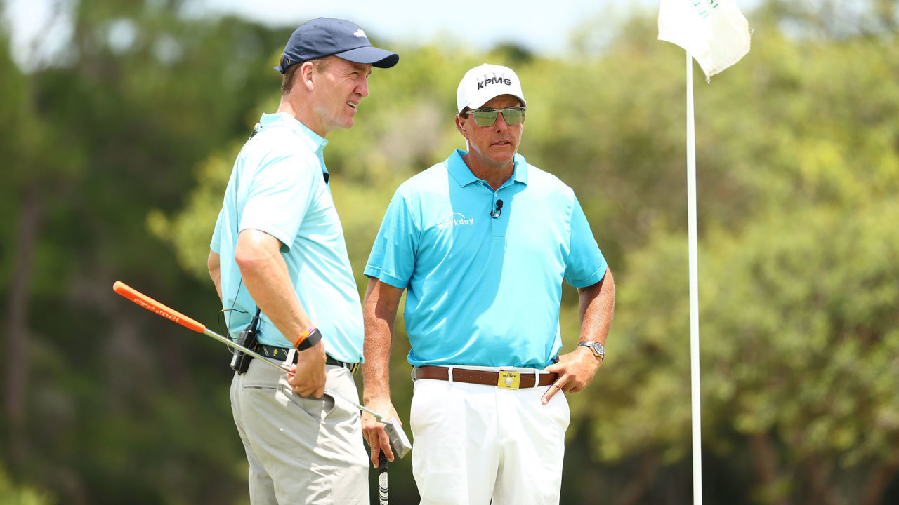 HOBE SOUND, FLORIDA - MAY 23: Former NFL player Peyton Manning and Phil Mickelson look on during a practice round for The Match: Champions For Charity at Medalist Golf Club on May 23, 2020 in Hobe Sound, Florida.