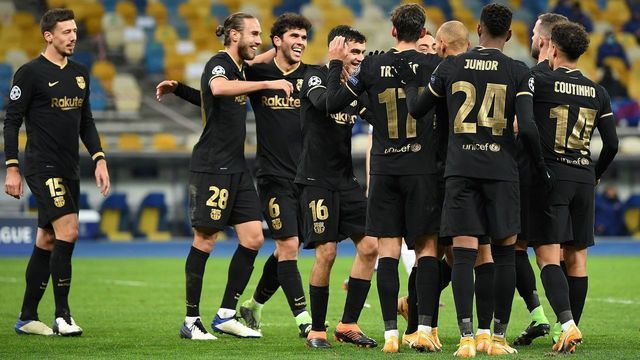Barcelona's players celebrate their second goal during the UEFA Champions League group G football match between Dynamo Kiev and Barcelona at the Olympiyskiy stadium in Kiev on November 24, 2020.