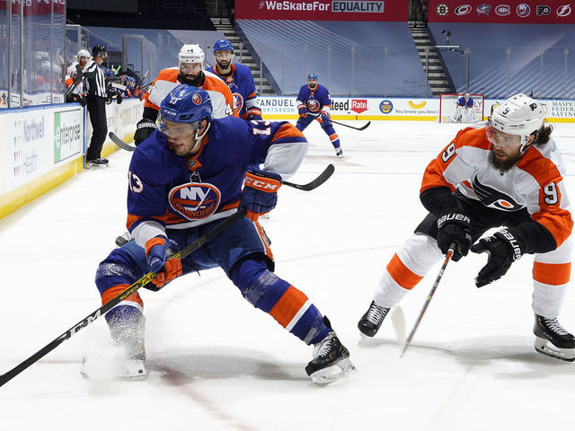 TORONTO, ONTARIO - SEPTEMBER 03: Mathew Barzal #13 of the New York Islanders turns away from Ivan Provorov #9 of the Philadelphia Flyers in the first period of Game Six of the Eastern Conference Second Round of the 2020 NHL Stanley Cup Playoff between the Philadelphia Flyers and the New York Islanders at Scotiabank Arena on September 03, 2020 in Toronto, Ontario.