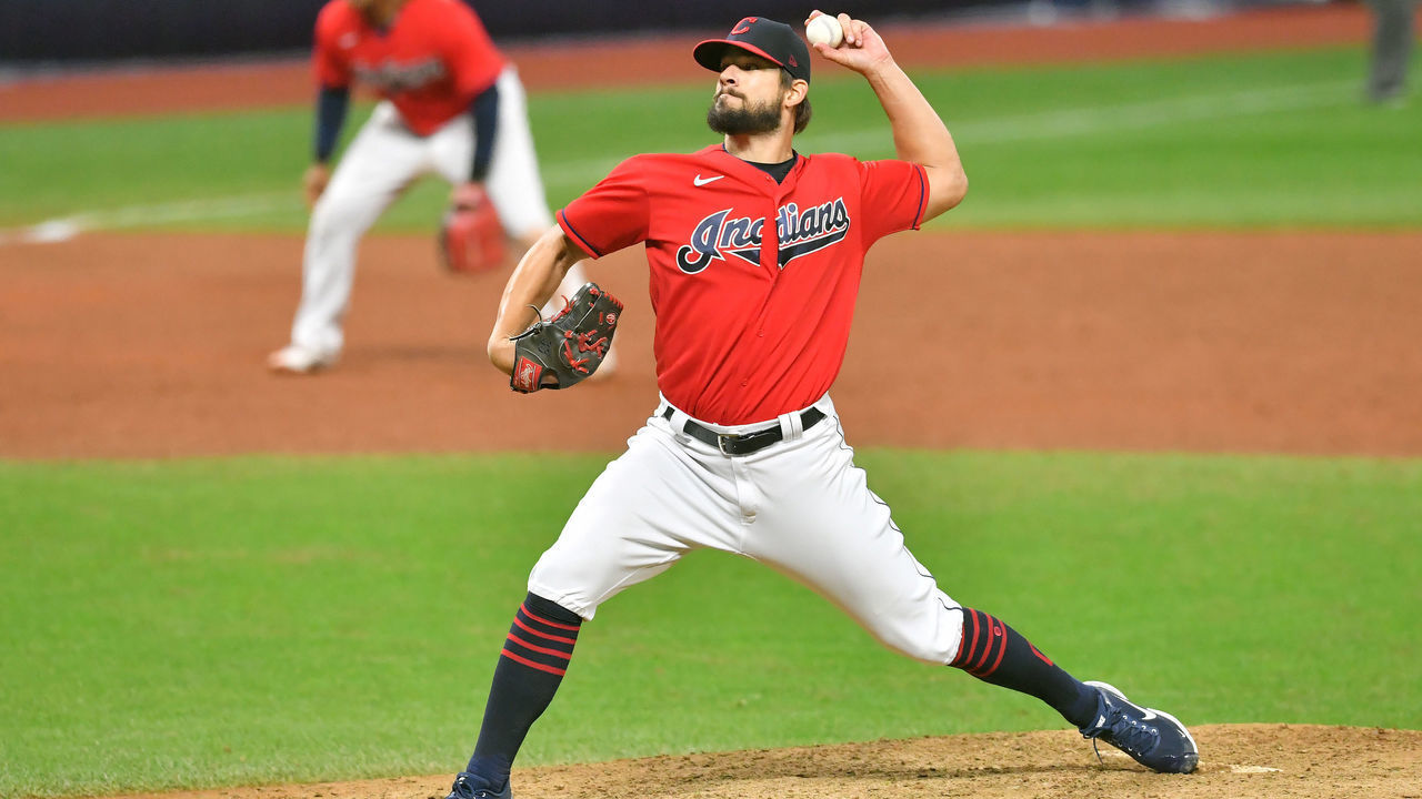 CLEVELAND, OHIO - SEPTEMBER 30: Closing pitcher Brad Hand #33 of the Cleveland Indians pitches during the ninth inning of Game Two of the American League Wild Card Series against the New York Yankees at Progressive Field on September 30, 2020 in Cleveland, Ohio. The Yankees defeated the Indians 10-9.