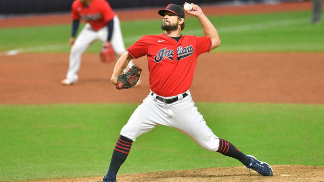 CLEVELAND, OHIO - SEPTEMBER 30: Closing pitcher Brad Hand #33 of the Cleveland Indians pitches during the ninth inning of Game Two of the American League Wild Card Series against the New York Yankees at Progressive Field on September 30, 2020 in Cleveland, Ohio. The Yankees defeated the Indians 10-9.