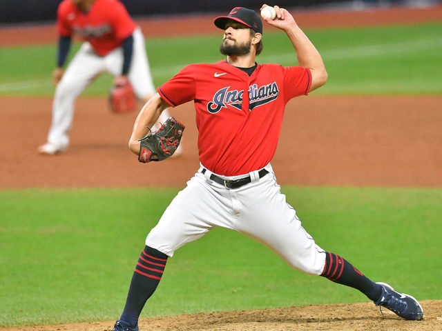 CLEVELAND, OHIO - SEPTEMBER 30: Closing pitcher Brad Hand #33 of the Cleveland Indians pitches during the ninth inning of Game Two of the American League Wild Card Series against the New York Yankees at Progressive Field on September 30, 2020 in Cleveland, Ohio. The Yankees defeated the Indians 10-9.