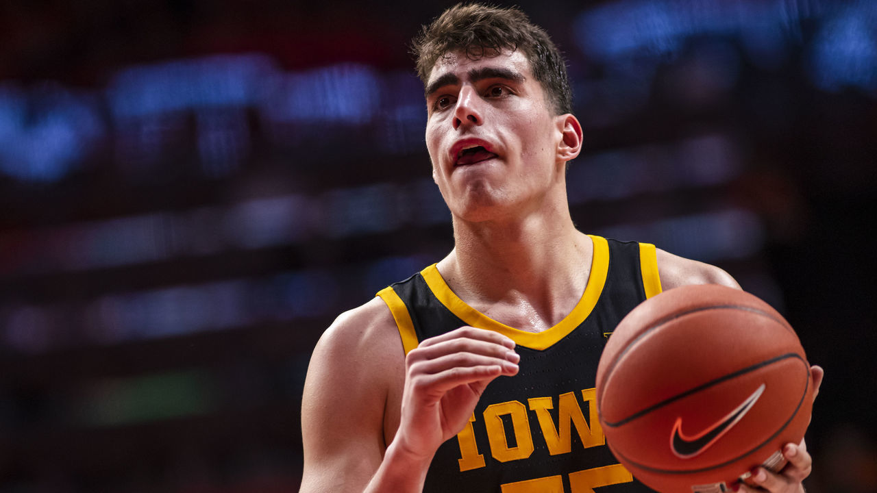 CHAMPAIGN, IL - MARCH 08: Luka Garza #55 of the Iowa Hawkeyes shoots a free throw during the game against the Illinois Fighting Illini at State Farm Center on March 8, 2020 in Champaign, Illinois.