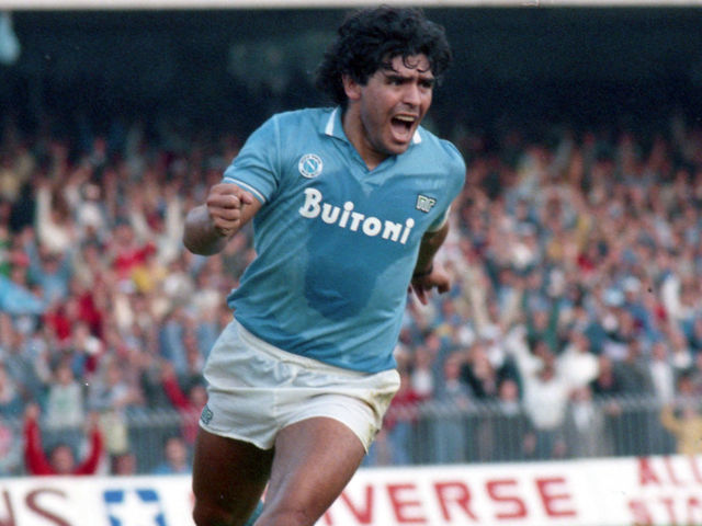 NAPLES, ITALY - OCTOBER 19: Diego Maradona of Napoli celebrates scoring his side's second goal from the penalty spot during the Serie A match between Napoli and Atalanta at the Stadio San Paolo on October 19, 1986 in Naples, Italy.