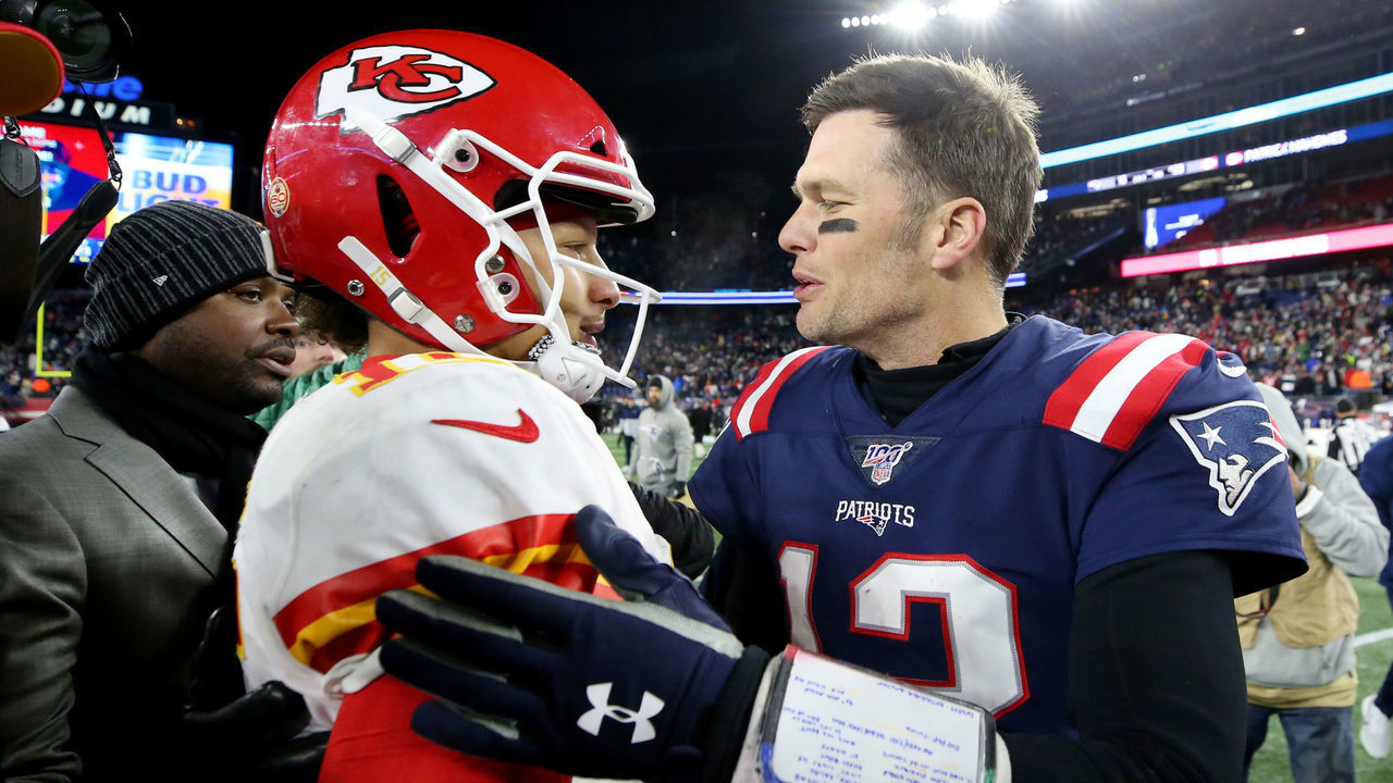 FOXBOROUGH, MASSACHUSETTS - DECEMBER 08: Tom Brady #12 of the New England Patriots talks with Patrick Mahomes #15 of the Kansas City Chiefs after the Chief defeat the Patriots 23-16 at Gillette Stadium on December 08, 2019 in Foxborough, Massachusetts.