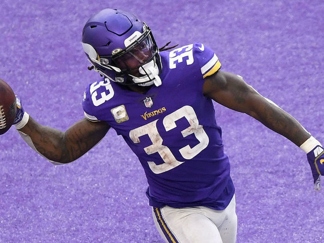 MINNEAPOLIS, MINNESOTA - NOVEMBER 08: Dalvin Cook #33 of the Minnesota Vikings runs the ball in for a touchdown against the Detroit Lions at U.S. Bank Stadium on November 08, 2020 in Minneapolis, Minnesota.