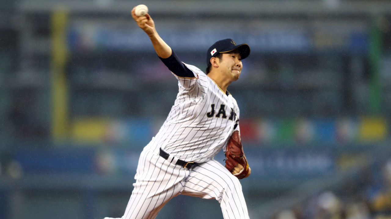 LOS ANGELES, CA - MARCH 21: Tomoyuki Sugano #11 of Team Japan pitches during Game 2 of the Championship Round of the 2017 World Baseball Classic against Team USA on Tuesday, March 21, 2017 at Dodger Stadium in Los Angeles, California.