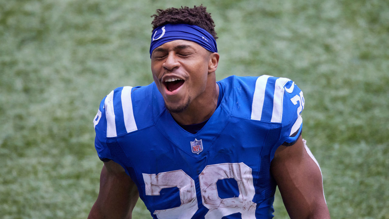 INDIANAPOLIS, IN - OCTOBER 18: Indianapolis Colts Running Back Jonathan Taylor (28) looks on in game action during a NFL game between the Indianapolis Colts and the Cincinnati Bengals on October 18, 2020, at Lucas Oil Stadium in Indianapolis, IN.