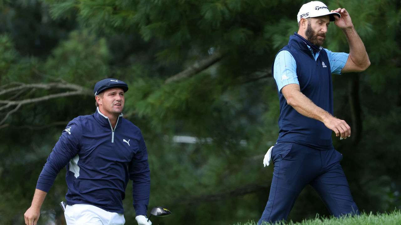 MAMARONECK, NEW YORK - SEPTEMBER 18: (L-R) Bryson DeChambeau of the United States and Dustin Johnson of the United States walk off the 11th tee during the second round of the 120th U.S. Open Championship on September 18, 2020 at Winged Foot Golf Club in Mamaroneck, New York.