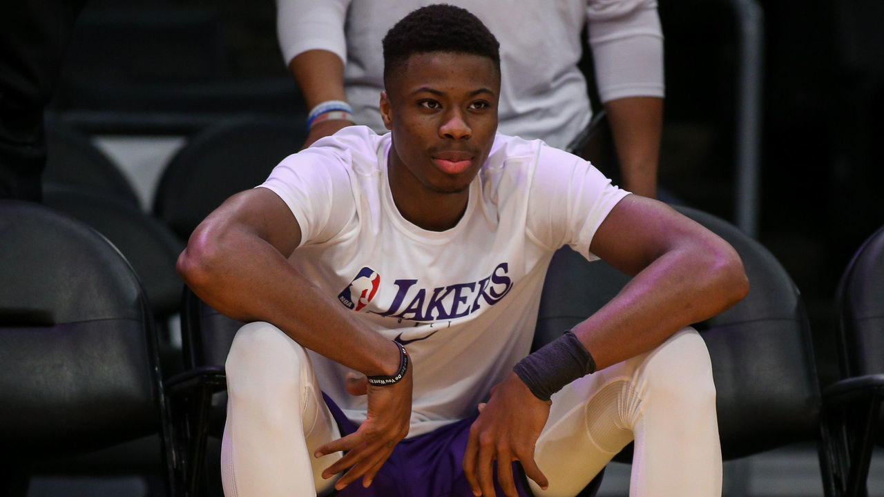 LOS ANGELES, CA - MARCH 06: Los Angeles Lakers forward Kostas Antetokounmpo (37) watches his brother warm up before the Milwaukee Bucks vs Los Angeles Lakers game on March 06, 2020, at Staples Center in Los Angeles, CA.
