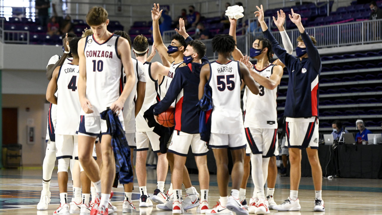 FORT MYERS, FLORIDA - NOVEMBER 26: Players from the Gonzaga Bulldogs react after defeating the Kansas Jayhawks during the Rocket Mortgage Fort Myers Tip-Off at Suncoast Credit Union Arena on November 26, 2020 in Fort Myers, Florida.