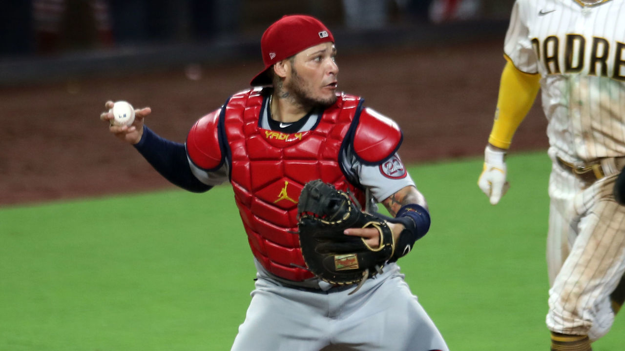 SAN DIEGO, CA - OCTOBER 02: Yadier Molina #4 of the St. Louis Cardinals turns a double play in the seventh inning during Game 3 of the Wild Card Series between the St. Louis Cardinals and the San Diego Padres at Petco Park on Friday, October 2, 2020 in San Diego, California.