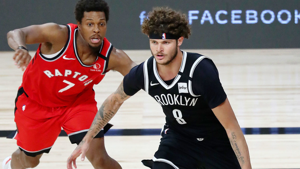 Aug 21, 2020; Lake Buena Vista, Florida, USA; Brooklyn Nets guard Tyler Johnson (8) drives to the basket as Toronto Raptors guard Kyle Lowry (7) pursues during the second half in game three of the first round of the 2020 NBA Playoffs at The Field House. Mandatory Credit: Kim Klement-USA TODAY Sports LAKE BUENA VISTA, FLORIDA - AUGUST 21: Tyler Johnson #8 of the Brooklyn Nets drives to the basket as Kyle Lowry #7 of the Toronto Raptors pursues during the second half in Game Three of the first round of the 2020 NBA Playoffs at The Field House at ESPN Wide World Of Sports Complex on August 21, 2020 in Lake Buena Vista, Florida.