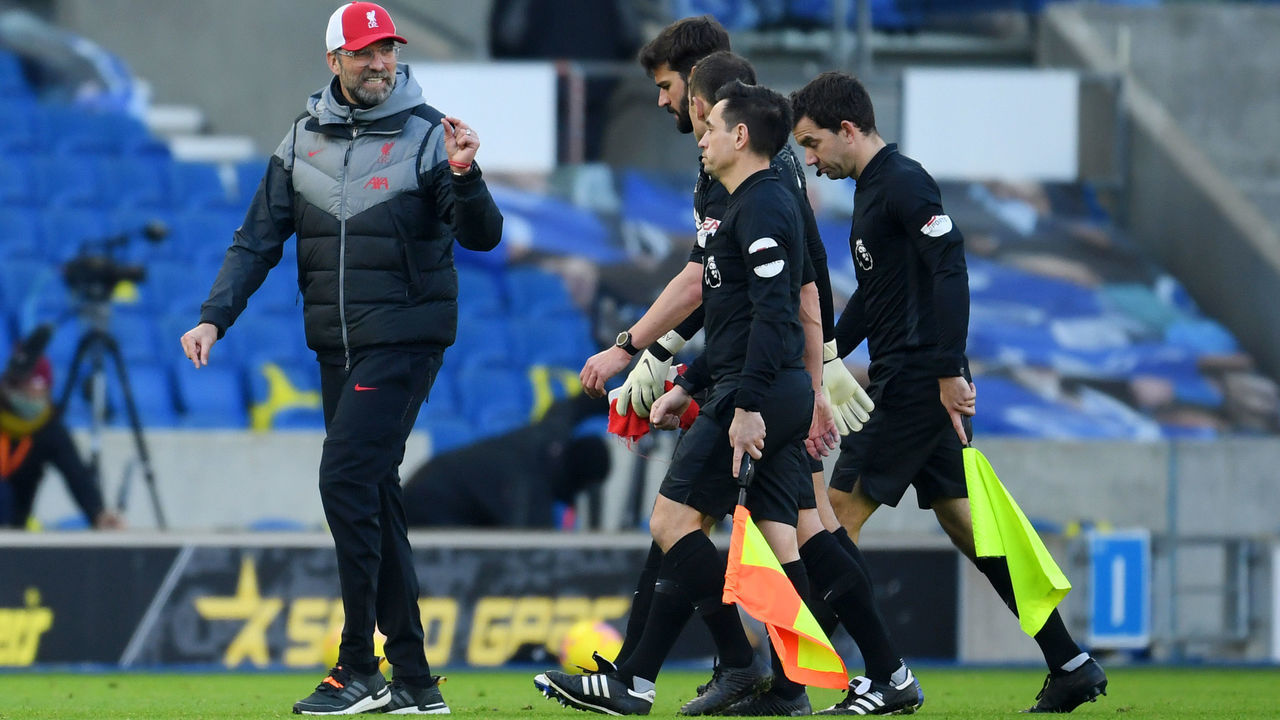 BRIGHTON, ENGLAND - NOVEMBER 28: Jurgen Klopp, Manager of Liverpool talks to referee Stuart Attwell after the Premier League match between Brighton & Hove Albion and Liverpool at American Express Community Stadium on November 28, 2020 in Brighton, England. Sporting stadiums around the UK remain under strict restrictions due to the Coronavirus Pandemic as Government social distancing laws prohibit fans inside venues resulting in games being played behind closed doors.