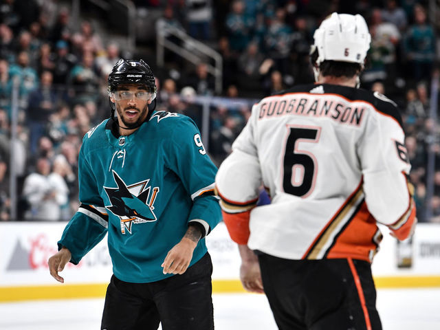 SAN JOSE, CA - JANUARY 27: Evander Kane #9 of the San Jose Sharks fights against Erik Gudbranson #6 of the Anaheim Ducks at SAP Center on January 27, 2020 in San Jose, California