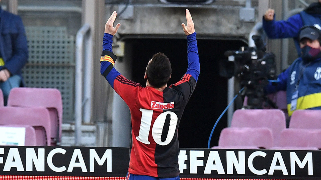 BARCELONA, SPAIN - NOVEMBER 29: Lionel Messi of Barcelona celebrates after scoring their sides fourth goal while wearing a Newell's Old Boys shirt with the number 10 on the back in memory of former footballer, Diego Maradona, who recently passed away during the La Liga Santander match between FC Barcelona and C.A. Osasuna at Camp Nou on November 29, 2020 in Barcelona, Spain. Sporting stadiums around Spain remain under strict restrictions due to the Coronavirus Pandemic as Government social distancing laws prohibit fans inside venues resulting in games being played behind closed doors.