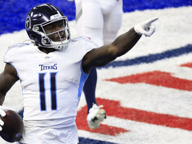 INDIANAPOLIS, INDIANA - NOVEMBER 29: A.J. Brown #11 of the Tennessee Titans reacts following a touchdown reception in the first quarter during their game against the Indianapolis Colts at Lucas Oil Stadium on November 29, 2020 in Indianapolis, Indiana.