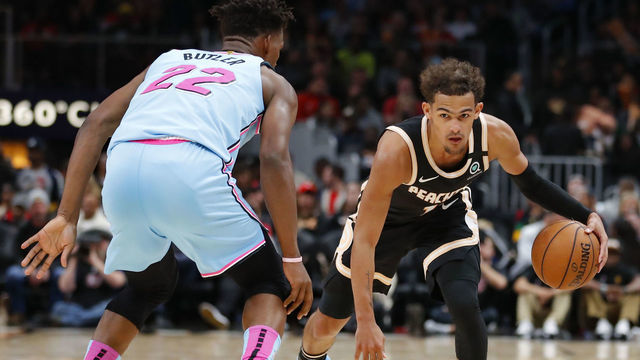 ATLANTA, GA - FEBRUARY 20: Trae Young #11 of the Atlanta Hawks controls the ball as Jimmy Butler #22 of the Miami Heat defendsduring the second half of an NBA game at State Farm Arena on February 20, 2020 in Atlanta, Georgia. NOTE TO USER: User expressly acknowledges and agrees that, by downloading and/or using this photograph, user is consenting to the terms and conditions of the Getty Images License Agreement.
