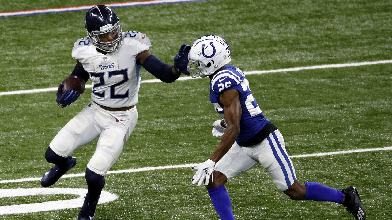 INDIANAPOLIS, INDIANA - NOVEMBER 29: Derrick Henry #22 of the Tennessee Titans carries the ball against Rock Ya-Sin #26 of the Indianapolis Colts during their game at Lucas Oil Stadium on November 29, 2020 in Indianapolis, Indiana.
