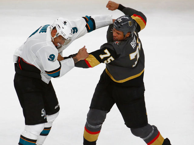 LAS VEGAS, NV - APRIL 14: Ryan Reaves (75) of the Vegas Golden Knights fights Evander Kane (9) of the San Jose Sharks during a Stanley Cup Playoffs first round game between the San Jose Sharks and the Vegas Golden Knights on April 14, 2019 at T-Mobile Arena in Las Vegas, Nevada.