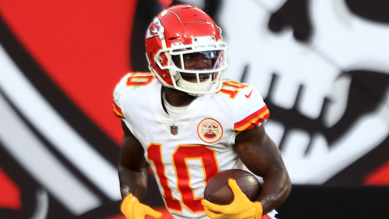 TAMPA, FLORIDA - NOVEMBER 29: Tyreek Hill #10 of the Kansas City Chiefs carries the ball in for a touchdown following a catch during their game against the Tampa Bay Buccaneers at Raymond James Stadium on November 29, 2020 in Tampa, Florida.