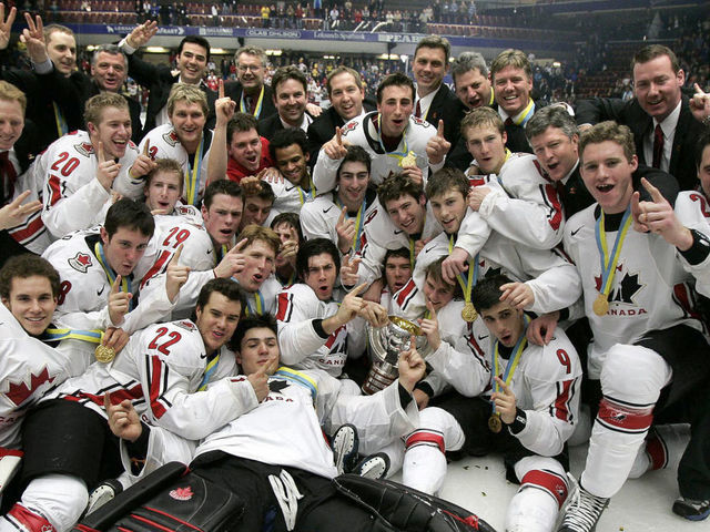 Leksand, SWEDEN: Team Canada players celebrate with gold medals around their necks after winning against Russia 4-2 in final at the 2007 IIHF World U20 hockey championship between Russia and Canada, 05 January 2007 in Leksand, Sweden. AFP PHOTO / SCANPIX SWEDEN / ANDERS WIKLUND