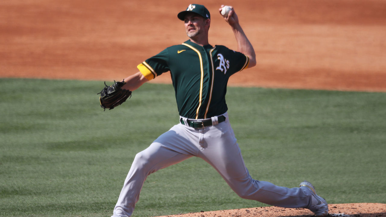 LOS ANGELES, CA - OCTOBER 08: Mike Minor #23 of the Oakland Athletics pitches in the fifth inning during Game 4 of the ALDS between the Houston Astros and the Oakland Athletics at Dodger Stadium on Thursday, October 8, 2020 in Los Angeles, California.