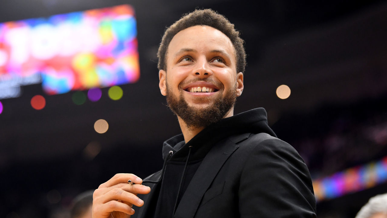 CLEVELAND, OHIO - FEBRUARY 01: Stephen Curry #30 of the Golden State Warriors talks with a teammate during a time out during the second half against the Cleveland Cavaliers at Rocket Mortgage Fieldhouse on February 01, 2020 in Cleveland, Ohio. The Warriors defeated the Cavaliers 131-112. NOTE TO USER: User expressly acknowledges and agrees that, by downloading and/or using this photograph, user is consenting to the terms and conditions of the Getty Images License Agreement.