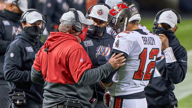 CHICAGO, IL - OCTOBER 08: Tampa Bay Buccaneers Quarterback Tom Brady (12) talks with Tampa Bay Head Coach Bruce Arians and Offensive Coordinator Byron Leftwich in game action during a NFL game between the Chicago Bears and the Tampa Bay Buccaneers on October 8th, 2020, at Soldier Field in Chicago, IL.
