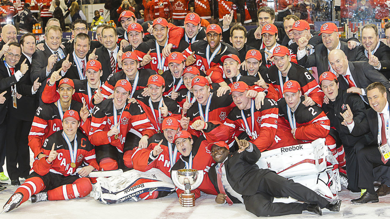 January 05 2015: Team Canada players and coaching staff celebrate with championship trophy following Canada's 5-4 victory over Russia at the IIHF World Junior Championship at Air Canada Centre in Toronto, Canada.