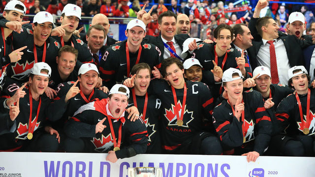 OSTRAVA, CZECH REPUBLIC - JANUARY 5, 2020: Canadian players and coaching staff pose for a group photograph during the medal ceremony for the 2020 World Junior Ice Hockey Championship final match between Canada and Russia at Ostravar Arena; Canada won 4-3. Peter Kovalev/TASS