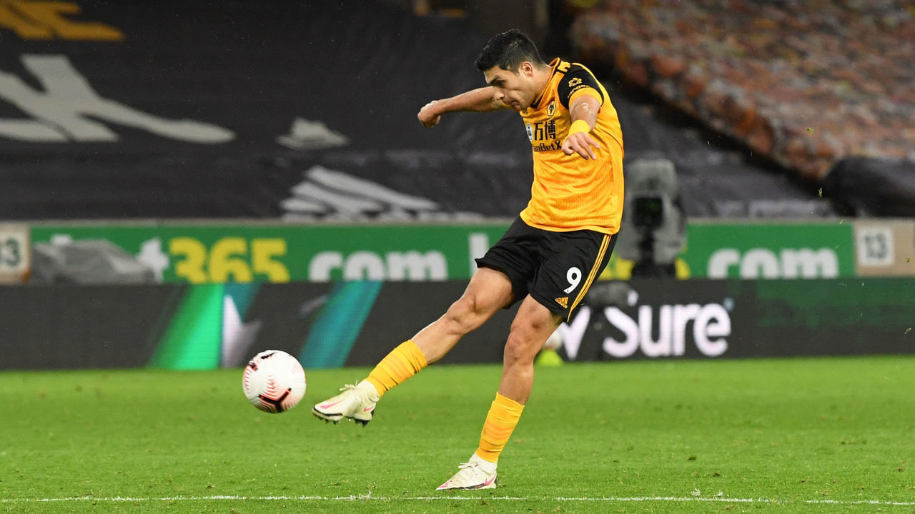 WOLVERHAMPTON, ENGLAND - OCTOBER 25: Raul Jimenez of Wolverhampton Wanderers scores his sides first goal during the Premier League match between Wolverhampton Wanderers and Newcastle United at Molineux on October 25, 2020 in Wolverhampton, England. Sporting stadiums around the UK remain under strict restrictions due to the Coronavirus Pandemic as Government social distancing laws prohibit fans inside venues resulting in games being played behind closed doors.