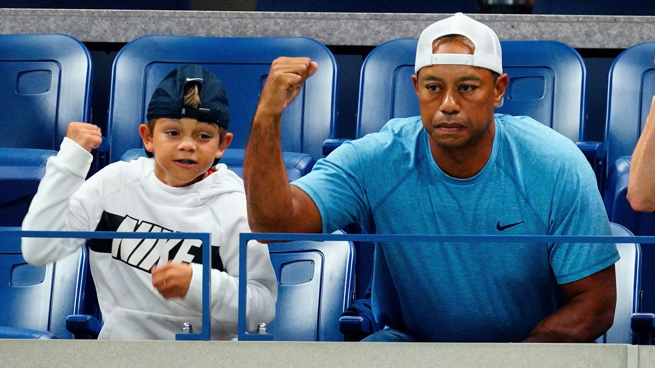 NEW YORK, NEW YORK - SEPTEMBER 03: (L-R) Charlie Axel Woods and Tiger Woods are seen at The 2019 US Open Tennis Championships on September 03, 2019 in New York City.