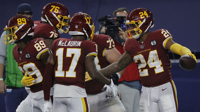 ARLINGTON, TEXAS - NOVEMBER 26: Antonio Gibson #24 of the Washington Football Team celebrates with Terry McLaurin #17, Chase Roullier #73 and Morgan Moses #76 after rushing for a 23-yard touchdown during the fourth quarter of a game against the Dallas Cowboys at AT&T Stadium on November 26, 2020 in Arlington, Texas.