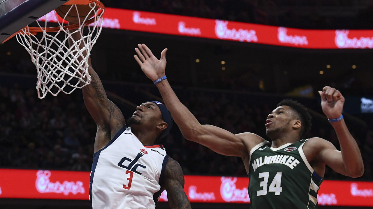WASHINGTON, DC - FEBRUARY 24: Washington Wizards guard Bradley Beal (3) beats Milwaukee Bucks forward Giannis Antetokounmpo (34) to the basket during the first half of the game between the Washington Wizards and the Milwaukee Bucks at Capital One Arena on Monday, February 24, 2020.